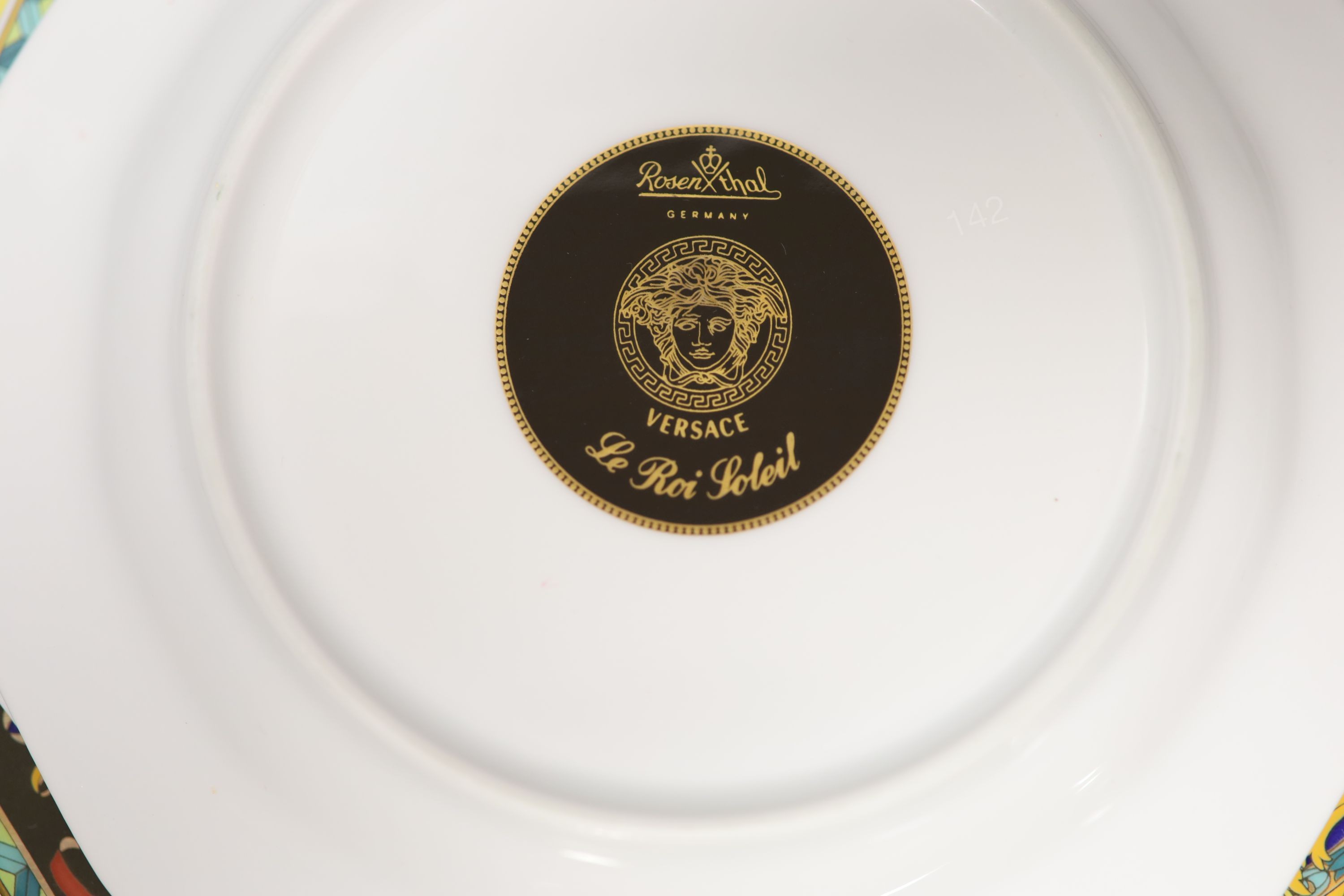 A group of Versace Rosenthal Le Roi Soleil plates and coffee cups and saucers and a bowl, 18.5cm, ten in total